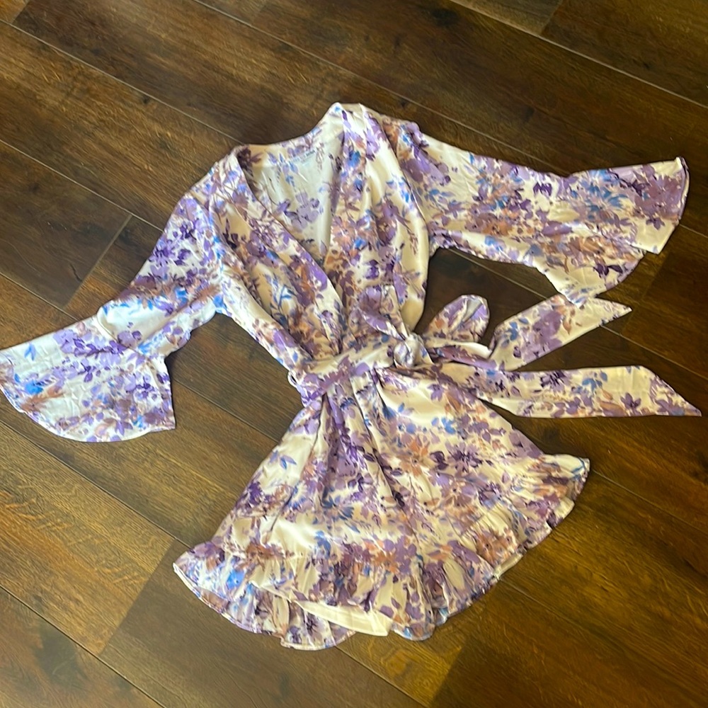 Lavender and white ruffle romper.